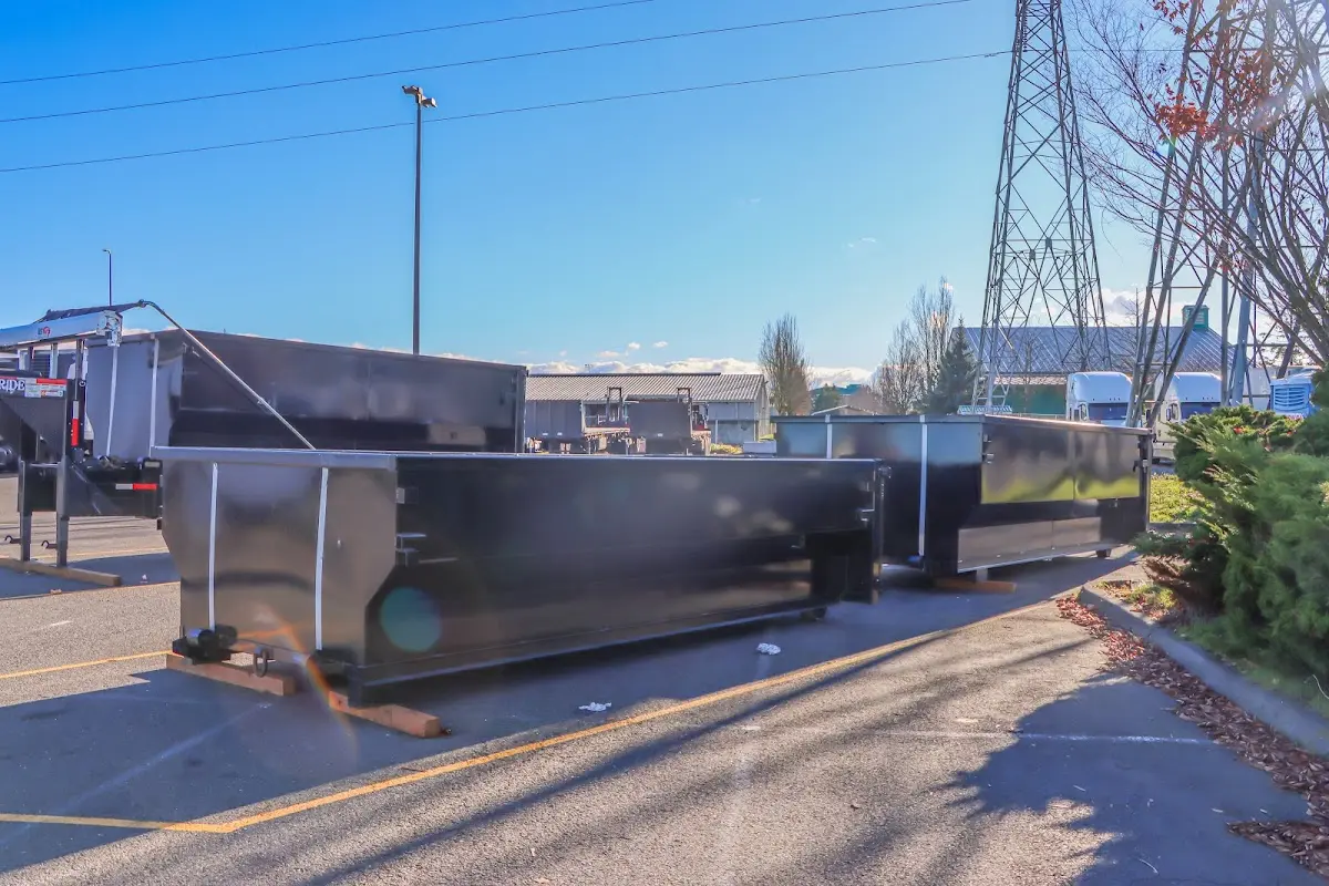 Roll-off dumpster ready for waste disposal at job site for 15 Yard Dumpster Rental in Sylvester